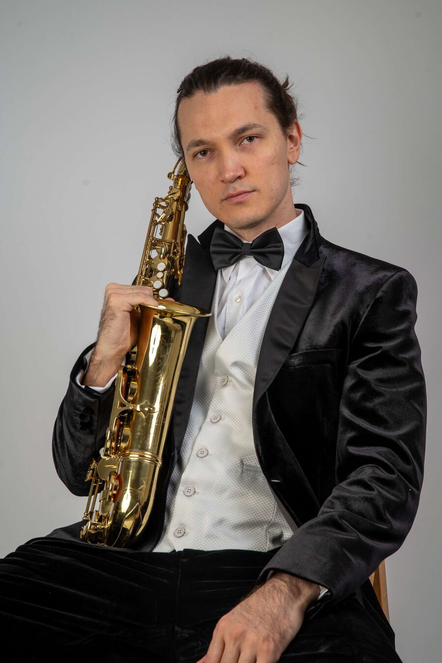 Timur Shved, professional saxophonist, with saxophone